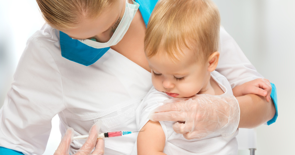 doctor does injection child vaccination baby